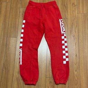 Team Bieber red sweatpants